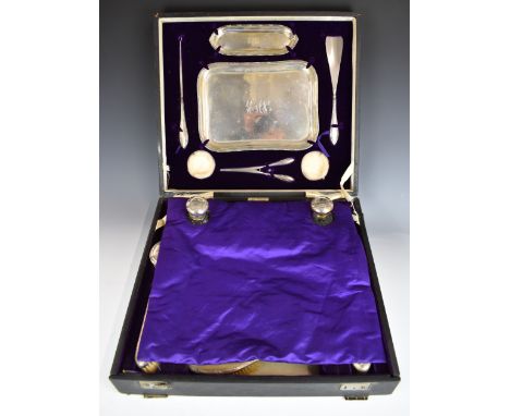 Queen Mary Royal interest Walker &amp; Hall hallmarked silver dressing table set, in fitted case with silver plaque to top 'T