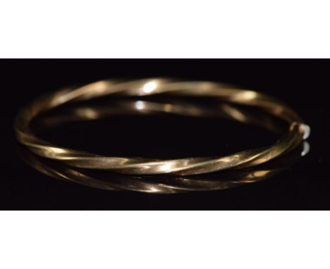 A 9ct gold twist bangle, 4.9g