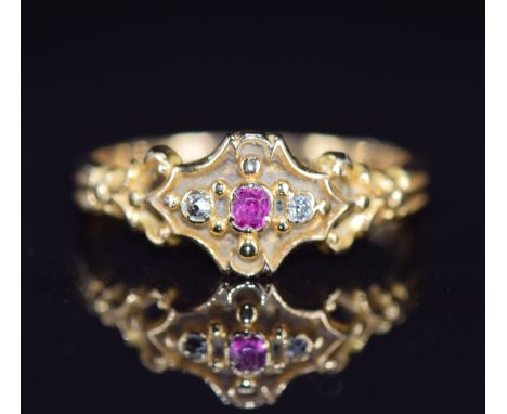 An 18ct gold ring set with a ruby and diamonds, 2.4g, size M