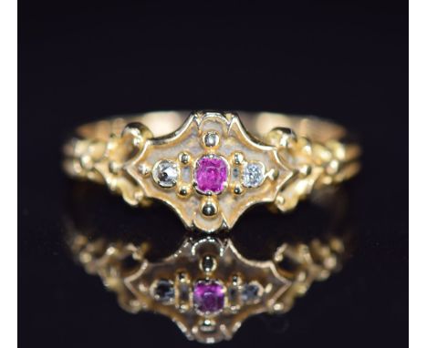 An 18ct gold ring set with a ruby and diamonds, 2.4g, size M