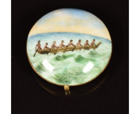 A 19th/20thC 9ct gold and enamel roundel decorated with figures in a dugout canoe, probably Polynesian / Maori or South Sea I