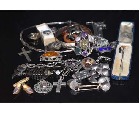 A collection of silver jewellery including bracelet, rings, two pairs of earrings, brooch in the form of a crown set with ena