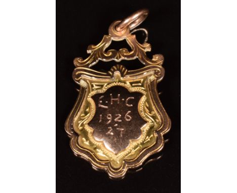 A 1920's 9ct gold fob / medallion awarded to Bretforton Football Club (near Evesham, Worcestershire), 5.0g, in vintage box