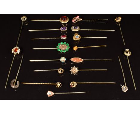 Fifteen Victorian stick pins including paste set, knot design, horseshoe and shield and six other stick pins&nbsp;