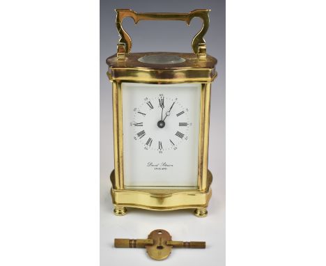 Gilt cased carriage clock by David Peterson with French movement, height including handle 15.5cm