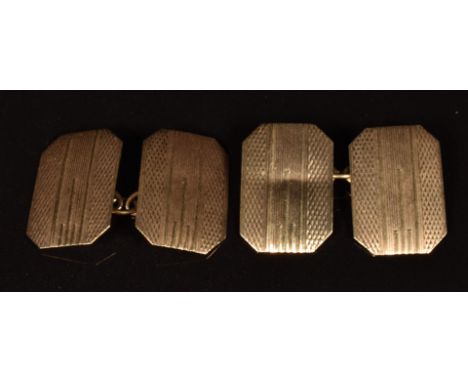 A pair of 9ct gold engine turned cufflinks, 2.4g