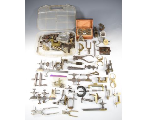 Watchmaker's tools including punch set, depthing tools, vices etc