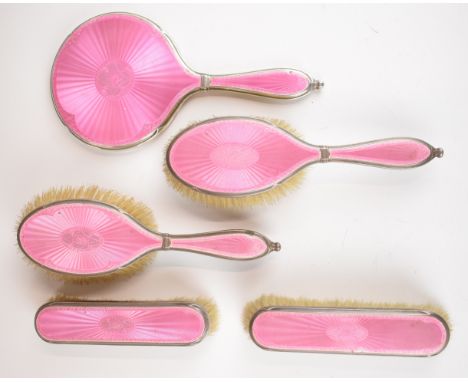 Art Deco hallmarked silver and pink guilloché enamel dressing table set comprising mirror and four brushes, London 1926, 1927