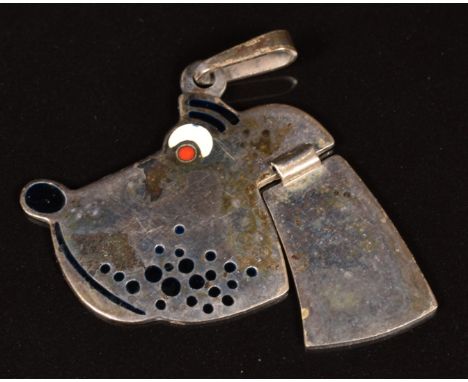 A silver pendant in the form of a dog with enamel detail, maker Uno-A-Erre