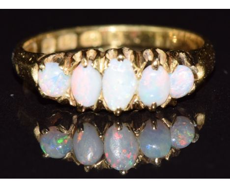 Victorian 18ct gold ring set with five opal cabochons, Birmingham 1881, 2.2g, size J