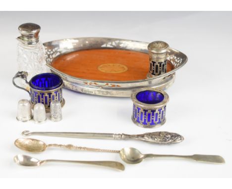 Hallmarked silver items comprising cut glass silver mounted scent bottle, oval tray with silver rim, Chester 1907, maker&nbsp