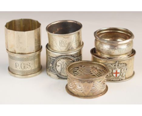 Seven various hallmarked silver napkin rings including one with enamel flag decoration, weight 162g all in