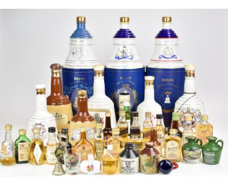 Nine bottles of Bell's presentation Scotch Whisky and approximately 25 whisky and other miniatures including Laphroaig, Glenm