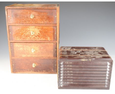 Bakelite chest of nine shallow drawers, each with 100 compartments housing capsules of very fine watch / clock parts, 900 cap