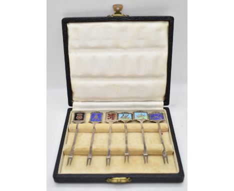 Cased set of Elizabeth II hallmarked silver novelty pickle forks formed as pub signs with enamel decoration and names to reve