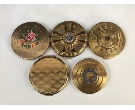 Vintage Stratton and other powder compacts, one decorated with transfer printed roses, another with a marcasite initial 'R'