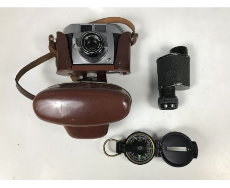 A Leiberman and Gortz 8 x 25 monocular together with a boxed Balda camera and pocket compass