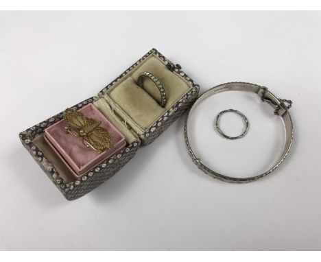 Vintage silver and white-metal jewellery, including a hinged bangle with faceted decoration, a c.1920s gilt white-metal filig