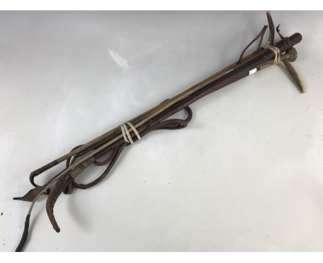 A 1912 silver-collared antler-handled riding crop / whip by Schomberg of London, together with a number of others, similar