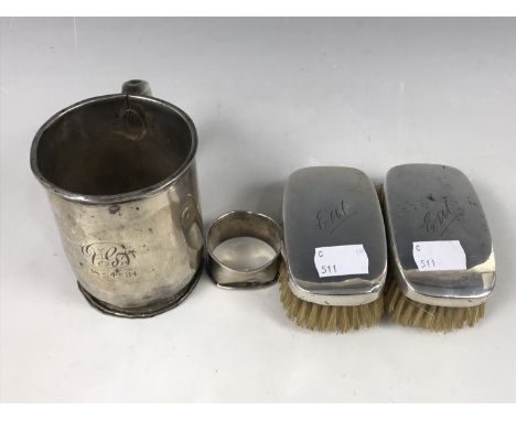 A George V silver monogrammed and dated christening cup, engraved '18-4-34' together with a silver napkin ring and two silver