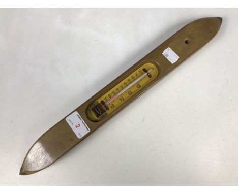 A novelty weaving loom shuttle thermometer