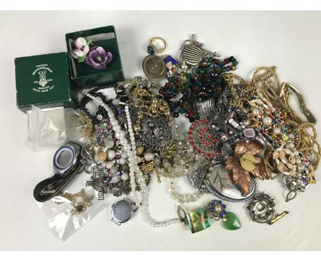 A quantity of vintage costume jewellery, including a sapphire and rolled-gold pendant necklace and earring set, and a boxed C