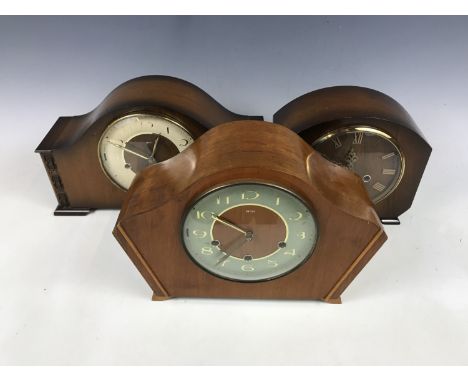 Two mid 20th Century Smith's mantel clocks together with a presentation mantel clock
