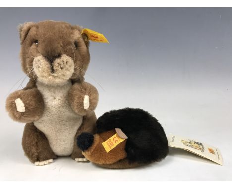A Steiff beaver together with a Steiff Mini Cosy Igel hedgehog, the latter with original paper tags