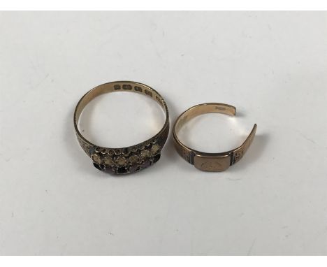 A Victorian yellow-metal dress ring with a foliate engraved shank (a/f), tests as gold, together with one further antique 9ct