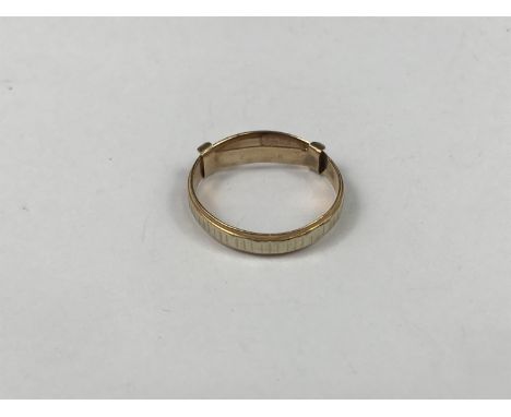 A high-carat yellow and white metal ring, stamped '750', tests as gold, 2.8g, together with a yellow-metal ring sizer, stampe