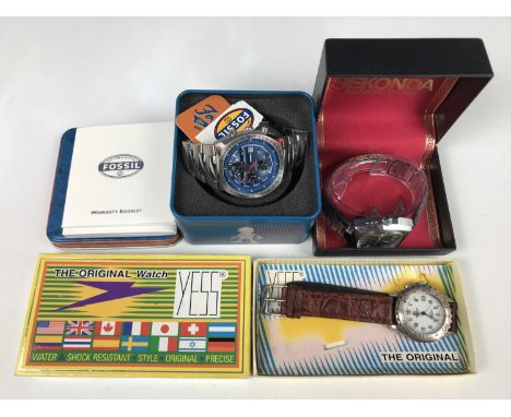 Three contemporary wrist watches in original packaging, respectively Fossil, Yess and Sekonda