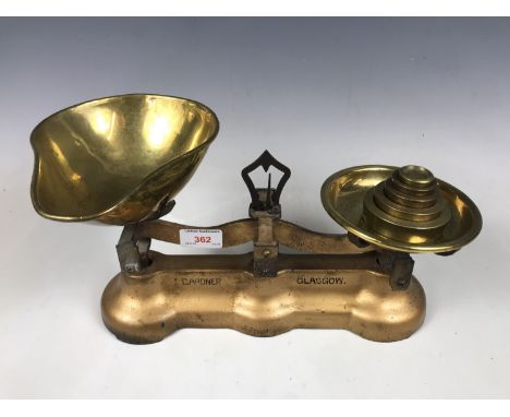 A set of J. Gardner of Glasgow brass kitchen scales with weights