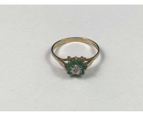 A 9ct gold, emerald and diamond ring, in a flower head cluster arrangement, 1.3g