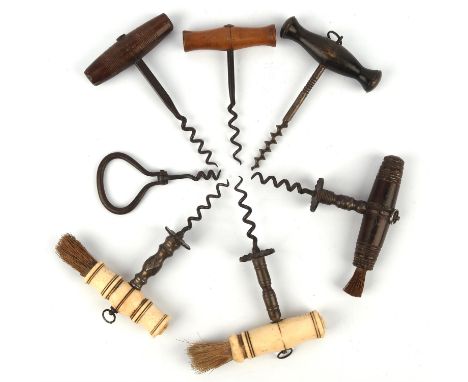 Two steel and bone handled cork screws, 19th Century, each with a brush to the terminal, 15.5cm long, together with another c