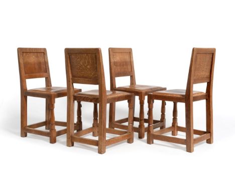 Mouseman: A Set of Four Robert Thompson English Oak Panel Back Dining Chairs, on octagonal front legs and square back legs, e