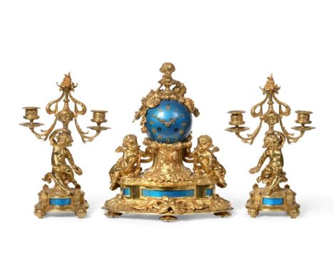 An Ormolu Striking Mantel Clock with Garniture, circa 1880, surmounted by a bust of a lady, flanked by winged cherubs, blue p