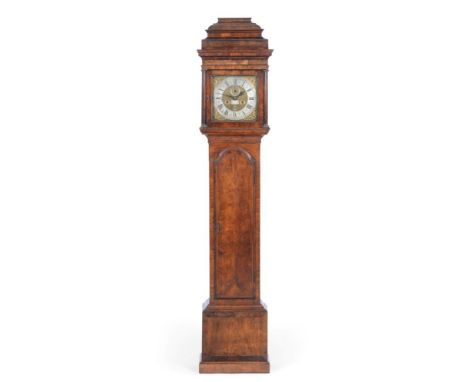 A Walnut Month Going Longcase Clock, early 18th Century, the case with good colour, caddied pediment, brass capped three-quar