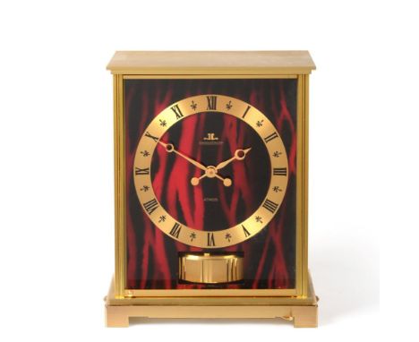 A Brass Red Faux Marble Panel Atmos Clock, signed Jaeger LeCoultre, model: Embassy Red, second half 20th century, case with r