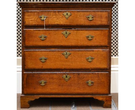A George III Oak and Burr Elm Crossbanded Straight Front Four Drawer Chest, of attractive proportions, with brass engraved ba