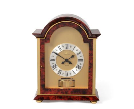 A Faux Tortoiseshell Atmos Clock, signed Jaeger LeCoultre, model: Windsor, second half 20th century, arched faux tortoiseshel