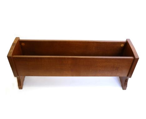 Mouseman: A Robert Thompson English Oak Planter, of rectangular form with shaped end supports, with carved mouse signature, 1