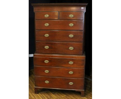 A George III Mahogany Chest on Chest, late 18th century, with dentil cornice above two short and three long graduated drawers