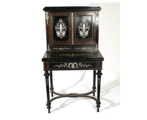 A Late 19th Century Italian Ebonised and Ivory Inlaid Writing Cabinet, in Louis XVI style, the upper section with cupboard do