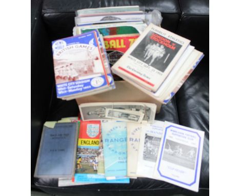 A box of mixed sporting ephemera, includes football and athletics
