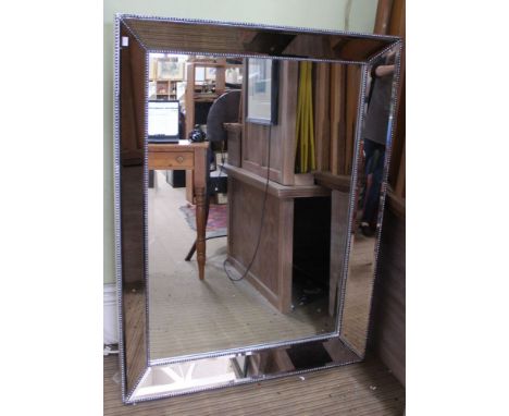 A bevel plate wall mirror, with mirror finish &amp; beaded frame, overall size 124cm x 93cm