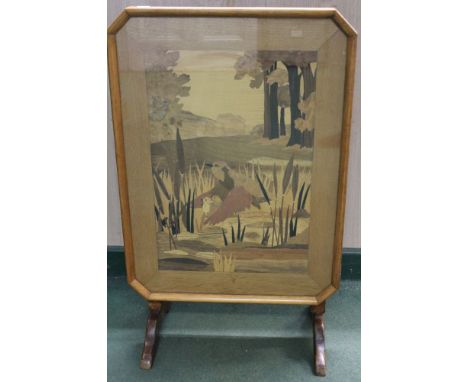 A marquetry metamorphic fire screen / occasional table with inlay depicting waterfowl with chicks&nbsp;