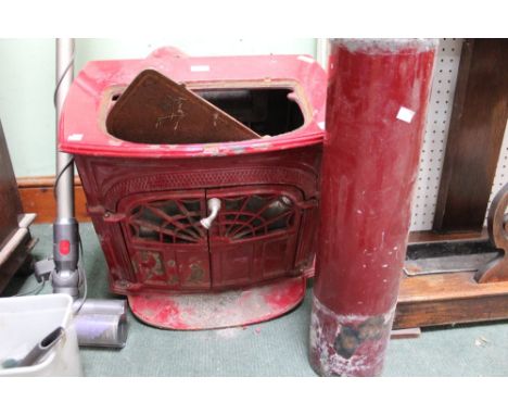 A red painted woodburner