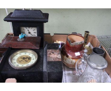 A Doulton Lambeth stoneware jug, with hallmarked silver rim, a Bier stein with engraved decoration, tea caddy, clocks etc