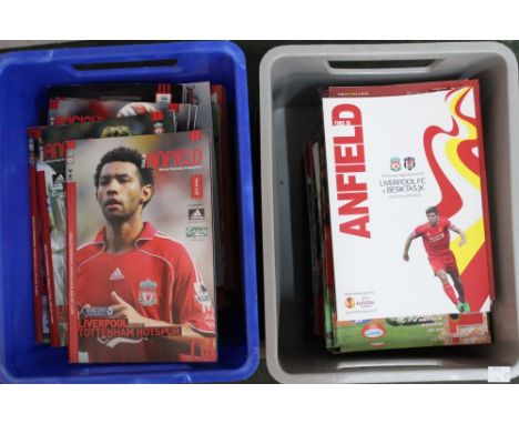 Two boxes of "Liverpool" football programmes