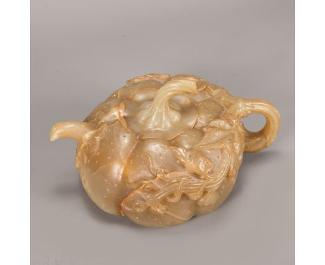 Large Jade tea pot, in pumpkin shape, light colours, sculpted leaves, hand grip, spout and lid; Qing Dynasty. 28x20x15 cm